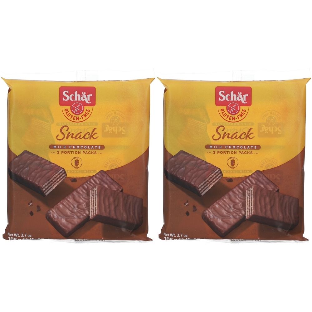 Deux paquets de Schär Snack. Inscription : sans gluten, Snack, chocolat au lait. Barres chocolatées visibles.