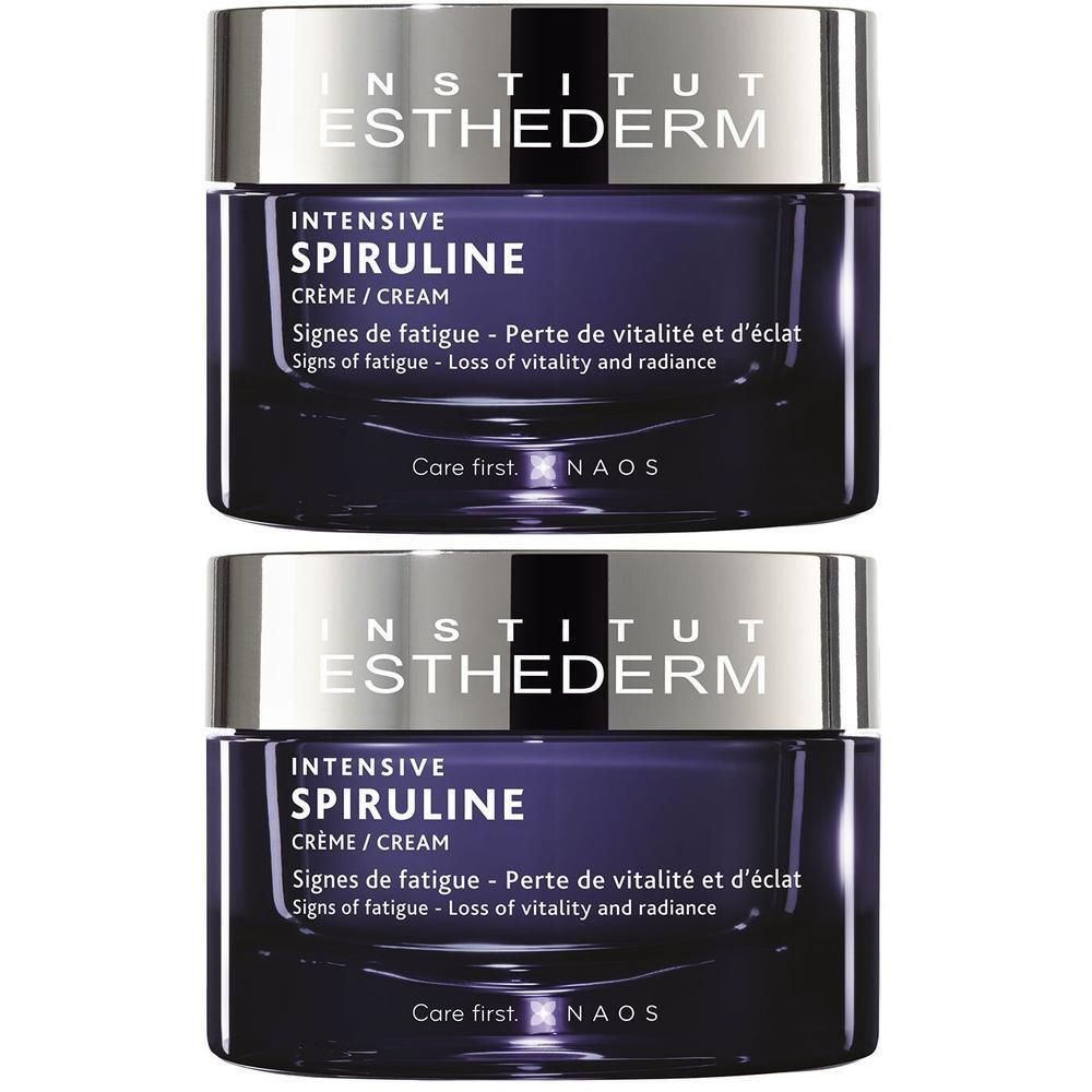 Twee potten Institut Esthederm Intensive Spiruline Crème. Donkerblauwe pot met zilveren deksel. Opschrift.