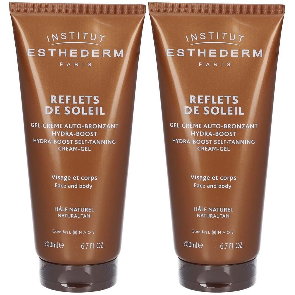 Twee tubes zelfbruiner. Bruine verpakking met witte tekst. Productnaam en details.