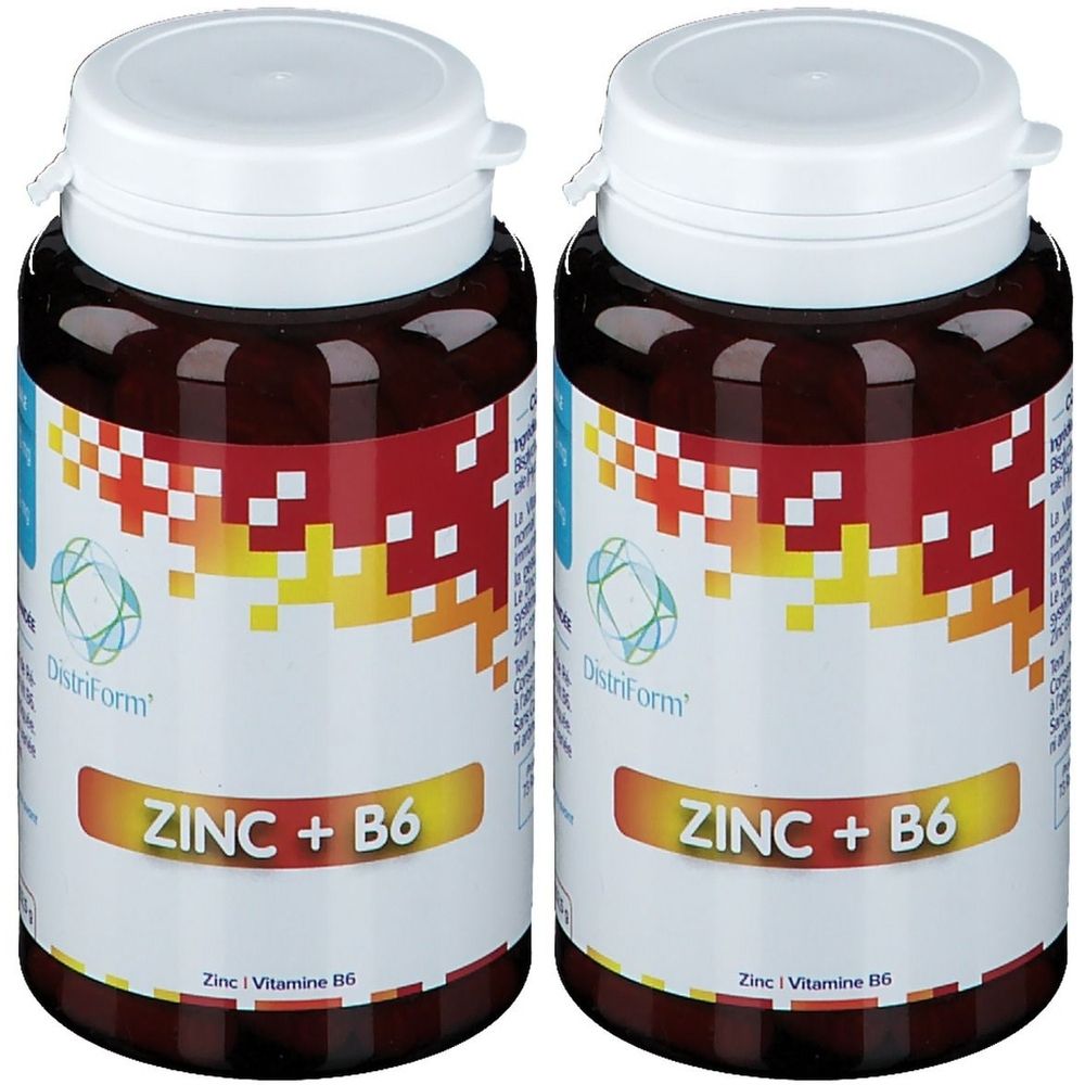 Twee bruine flessen met witte doppen. Op de etiketten staat "ZINC + B6" en "Distriform".