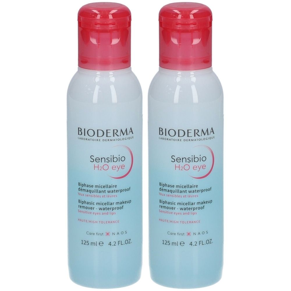 Twee flessen Bioderma Sensibio H2O eye. Witte flessen met roze doppen. Opschrift Sensibio H2O eye en Biphase micellaire démaquillant waterproof.