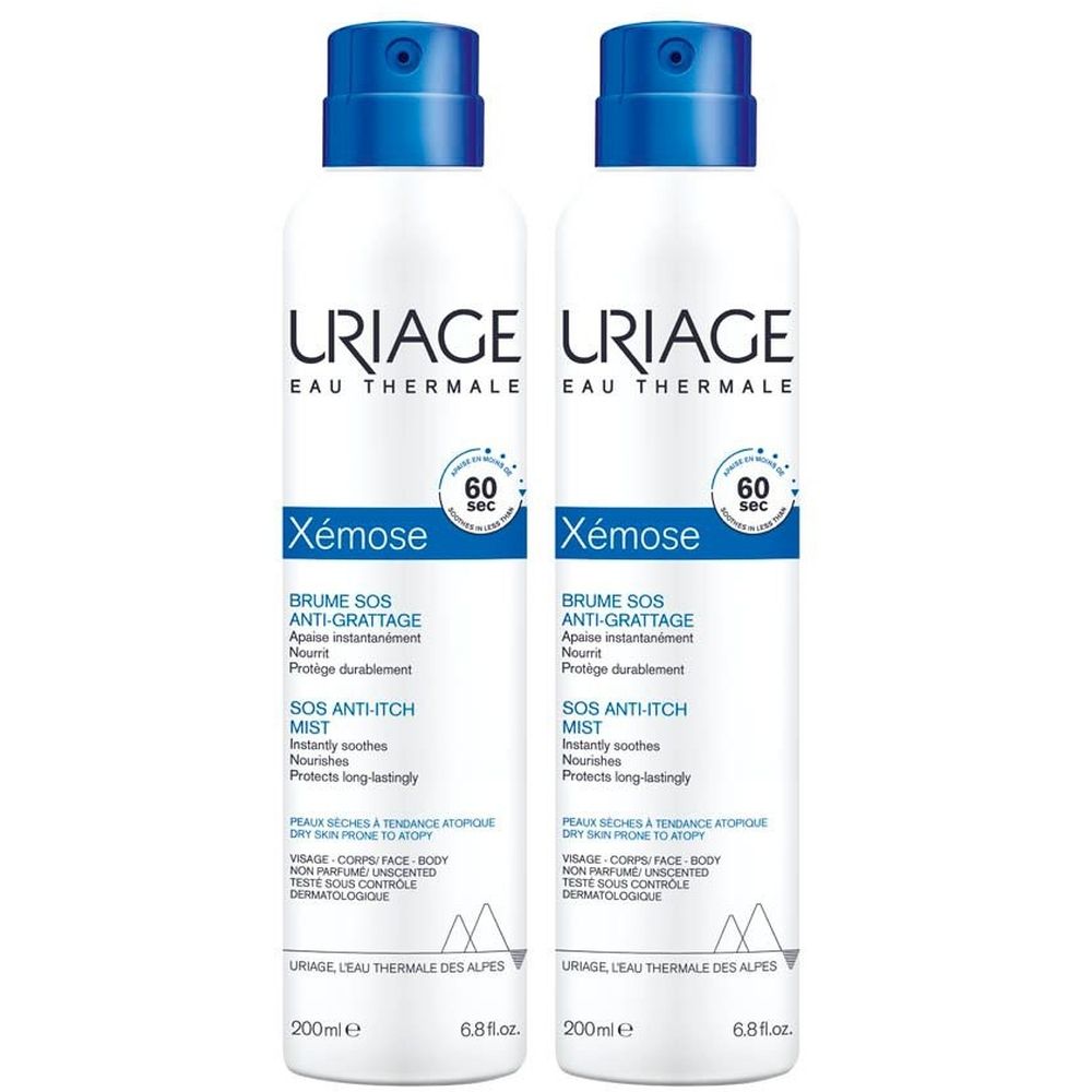 Deux sprays blancs avec bouchon bleu. Inscription: URIAGE, Xémose, Brume SOS anti-grattage.