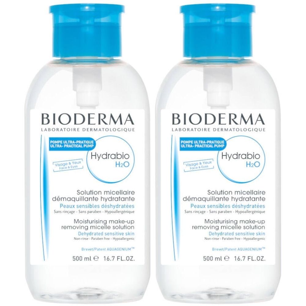 Twee flessen Bioderma Hydrabio H2O. Heldere vloeistof, blauwe doppen en pompen. Tekst: Hydrabio H2O, Solution micellaire.