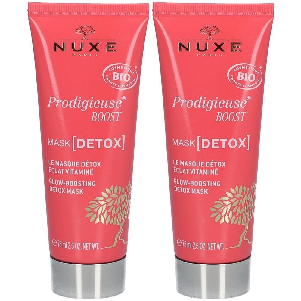 Deux tubes de Nuxe Prodigieuse Boost Mask [Detox]. Tubes roses avec bouchons argentés. Texte: BIO, masque, detox, vitamine.