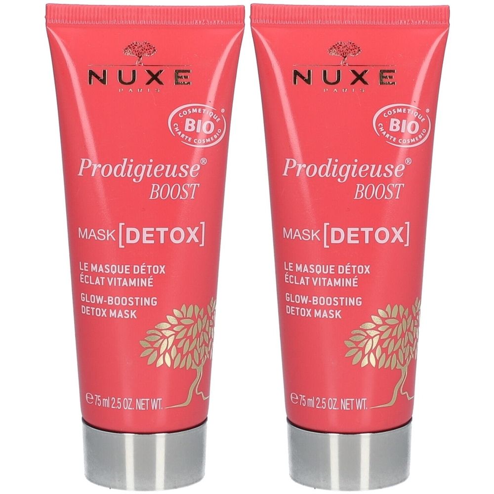 Twee tubes Nuxe Prodigieuse Boost Mask [Detox]. Roze tubes met zilveren doppen. Tekst: BIO, masker, detox, vitamine.