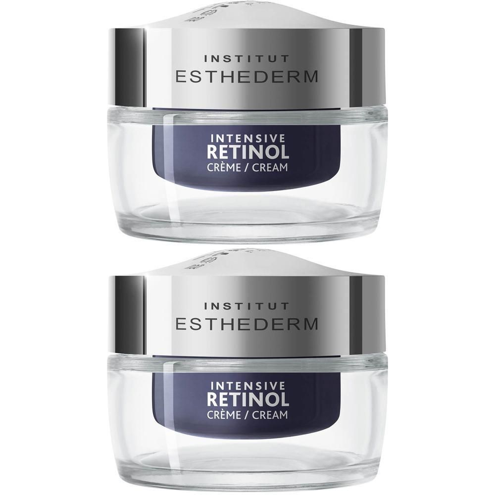 Deux pots de Crème Rétinol Intensive Institut Esthederm. Pots transparents avec couvercles argentés. Texte: Intensive Retinol Crème/Cream.