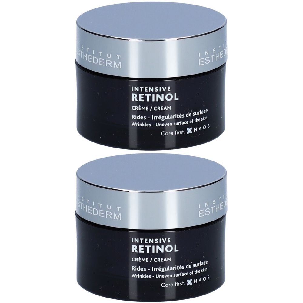 Deux pots de Crème Rétinol Intensive Institut Esthederm. Pots noirs avec couvercles argentés. Texte: Intensive Retinol Crème/Cream.