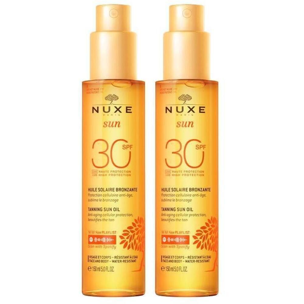 Twee flessen zonneolie met verstuiver. Opschrift: Nuxe Sun, SPF 30. Tekst: Huile Solaire Bronzante. 150 ml.