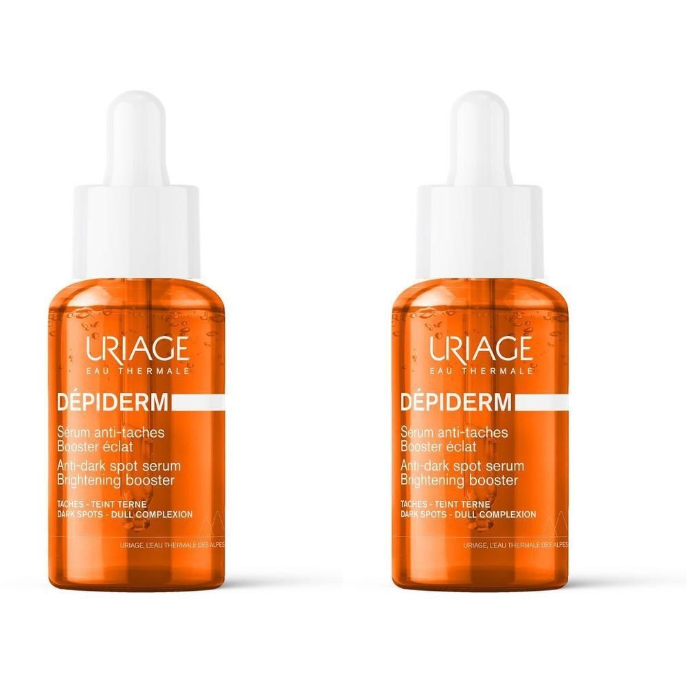 Deux flacons Uriage Dépiderm Sérum Anti-Taches Booster Éclat. Liquide orangé, pipette blanche.