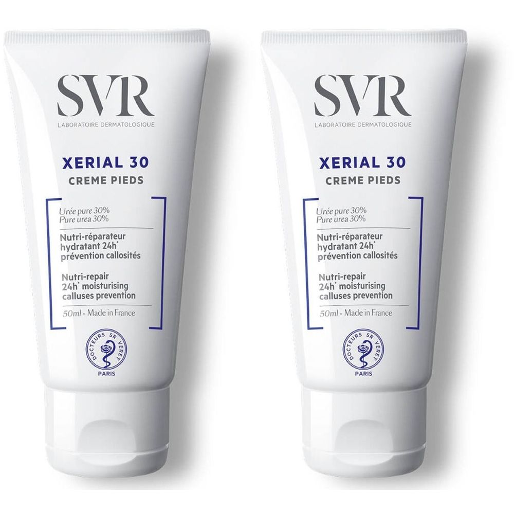 Twee tubes SVR XÉRIAL 30 voetcrème. Witte tubes met blauwe tekst. Opschrift: XÉRIAL 30, Crème Pieds. SVR logo.