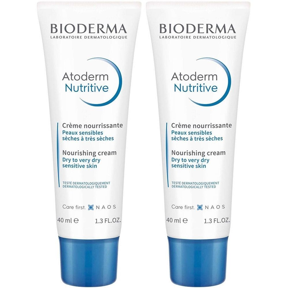 Twee tubes BIODERMA Atoderm Nutritive. Witte tubes met blauwe tekst en dop. Crème nourrissante, 40 ml.