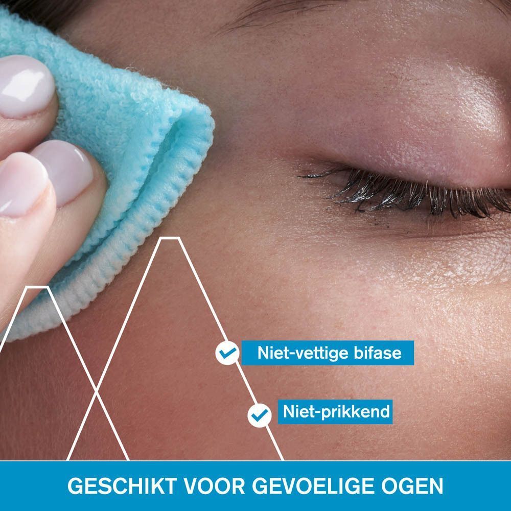Close-up van een oog dat wordt gereinigd met een blauwe doek. Tekst: Niet-vettige bifase, Niet-prikkend.