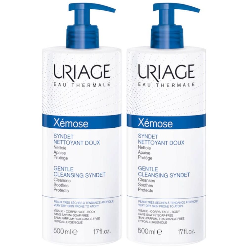Deux flacons Uriage Xemose Syndet, blancs avec pompes bleues. Texte : Uriage, Xemose, Syndet, 500ml, 17 fl.oz.
