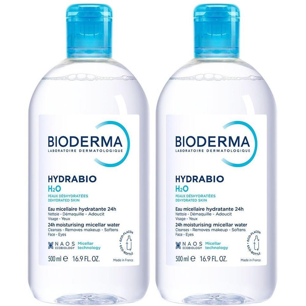 Twee flessen met blauwe dop. Opschrift: BIODERMA, Hydrabio H2O. Voor gevoelige huid. 500 ml.