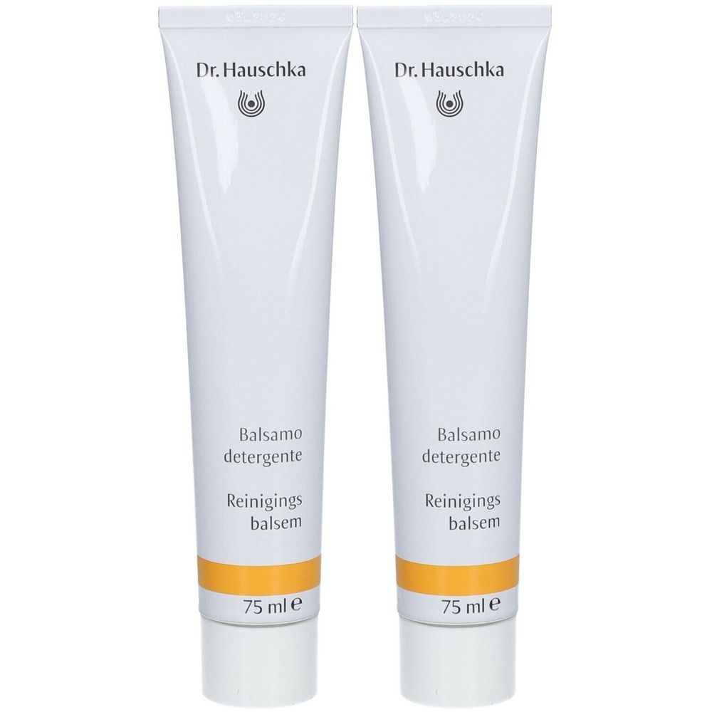 Twee witte tubes met gele band. Opschrift: Dr. Hauschka, Balsamo detergente, Reinigings balsem. 75 ml.
