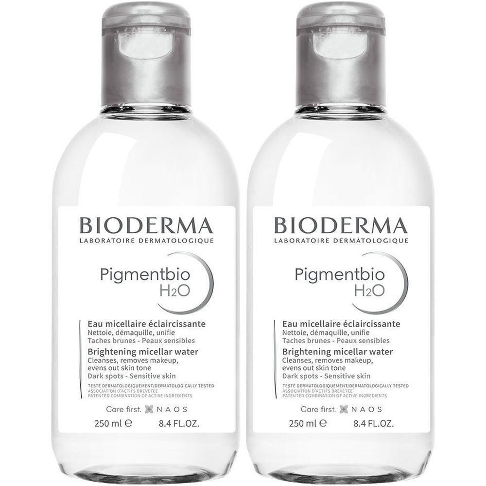 Twee flessen BIODERMA Pigmentbio H2O. Heldere vloeistof, zilveren dop, wit etiket met tekst.