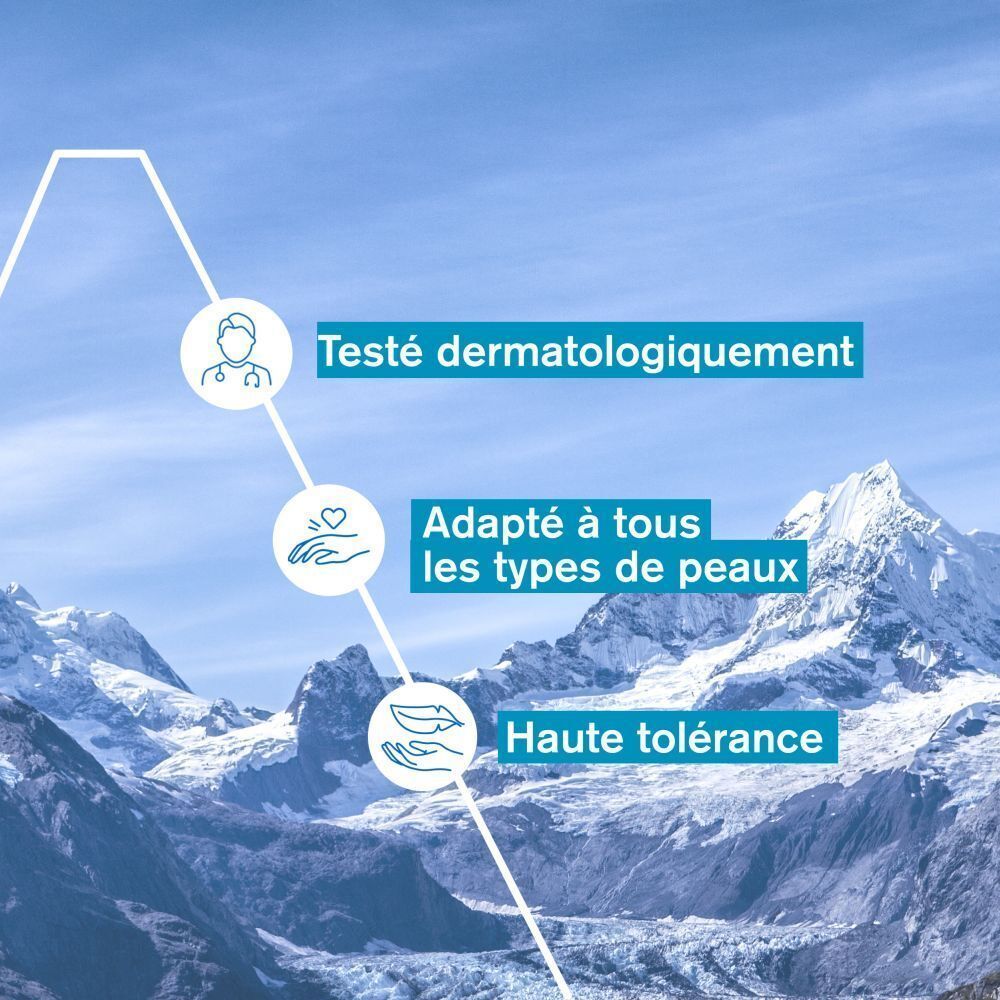 Texte: Testé, adapté à tous les types de peaux, haute tolérance. Fond: paysage de montagne.