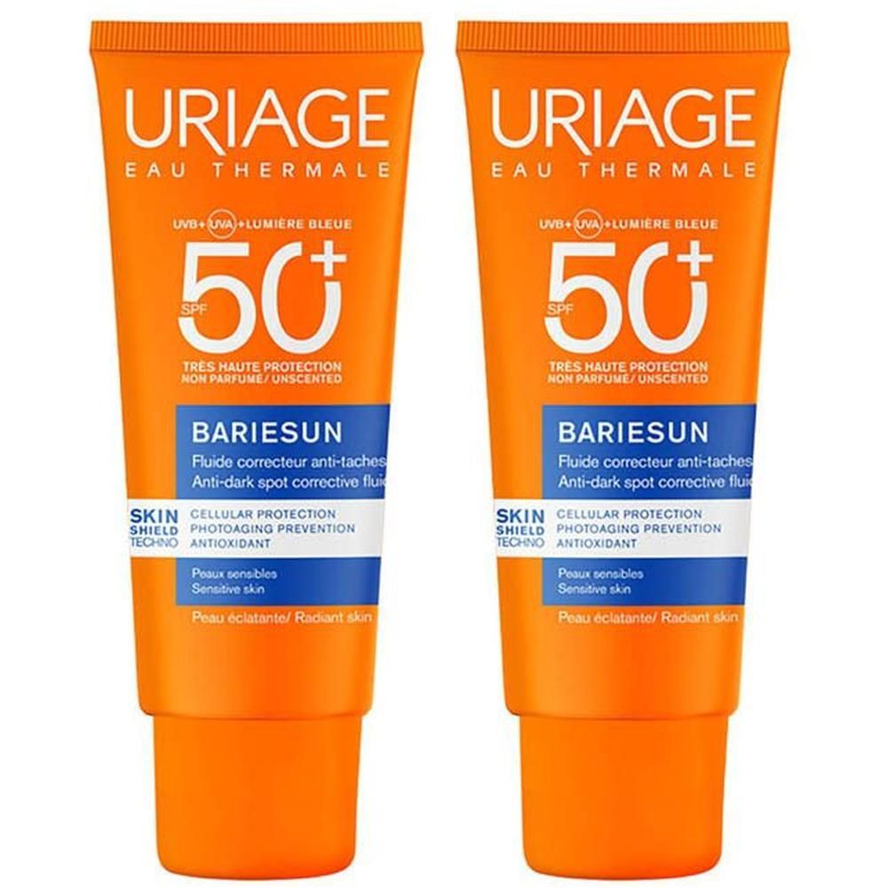 Twee oranje tubes Uriage Bariésun Fluide Anti-Taches SPF50+. Tekst en logo op de voorkant. Oranje dop.