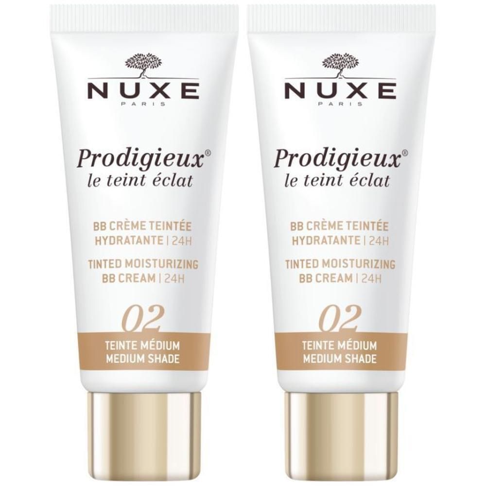 Deux tubes de BB Crème. Inscription: Nuxe, Prodigieux, Teinte Médium 02. Bouchon doré.