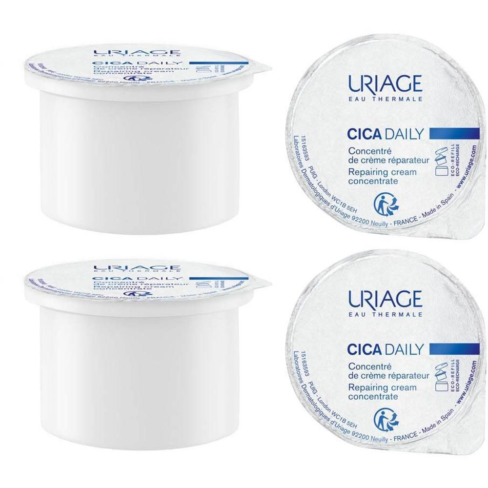 Twee witte crème potjes met deksels. Tekst: Uriage, CICA Daily. Deksel met tekst. Herstellende crème.