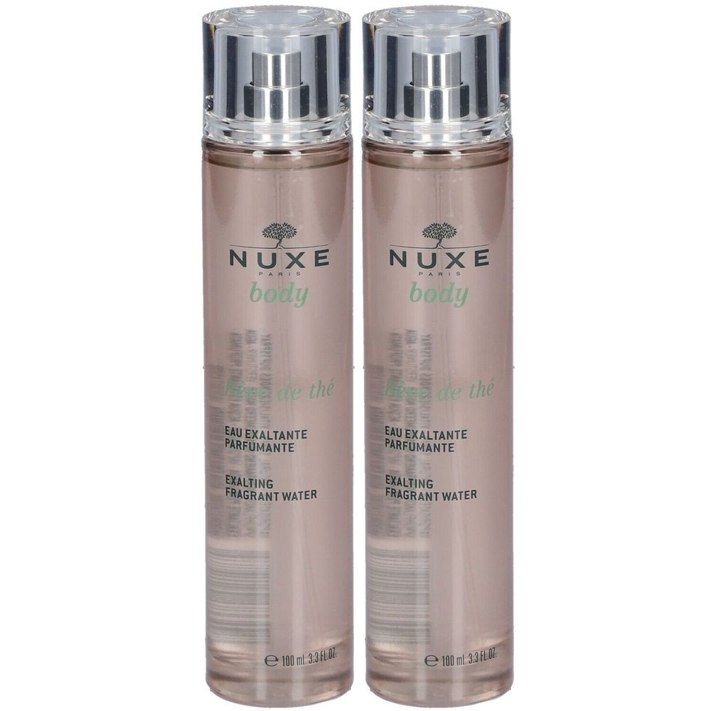 Twee flacons met verstuiver. Opschrift: NUXE body, Eau Exaltante Parfumante, Exalting Fragrant Water.