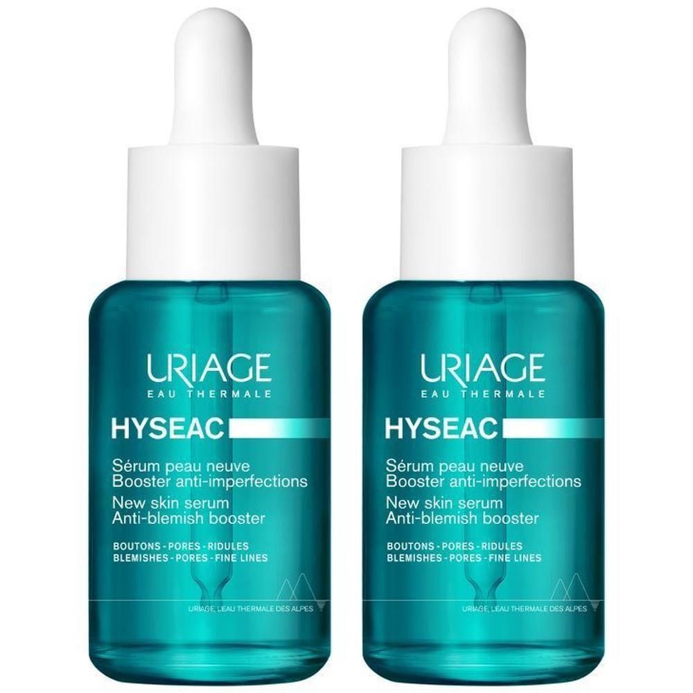 Twee serumflessen met witte dop en pipet. Turkoois glas met witte tekst. Opschrift: Uriage Hyséac.