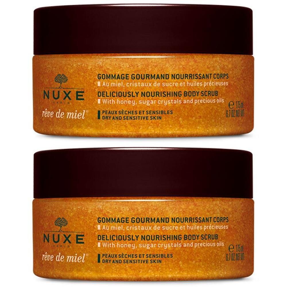 Twee potten NUXE Rêve de Miel® body scrub. Bruine deksels, goudkleurige inhoud. Opschrift: Gommage Gourmand Nourrissant Corps.