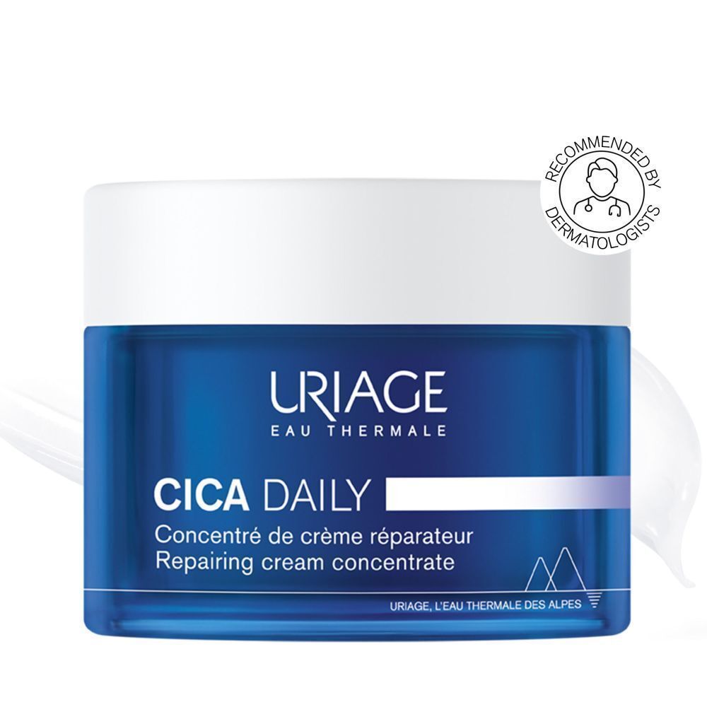 Blauwe pot Uriage Cica Daily. Tekst: Concentré de crème réparateur, Repairing cream concentrate. Aanbevolen door dermatologen.