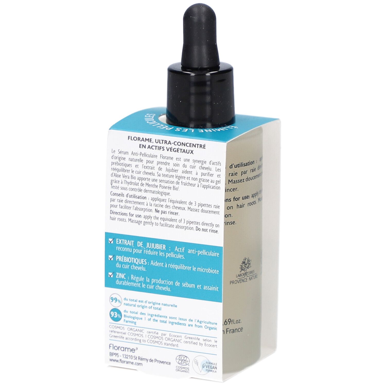 Achterkant van serumverpakking. Tekst: ingrediënten, gebruik, logo's. Fles met zwarte druppelaar.