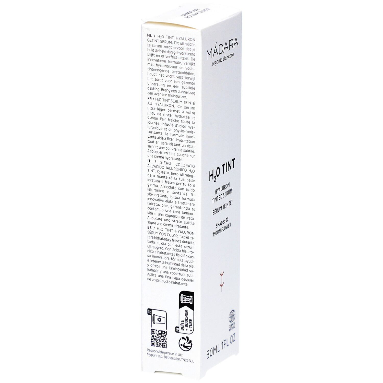 Witte verpakking, zijaanzicht. Tekst in meerdere talen. Onder: QR-code en logo's. Onder: 30ml 1FL OZ.