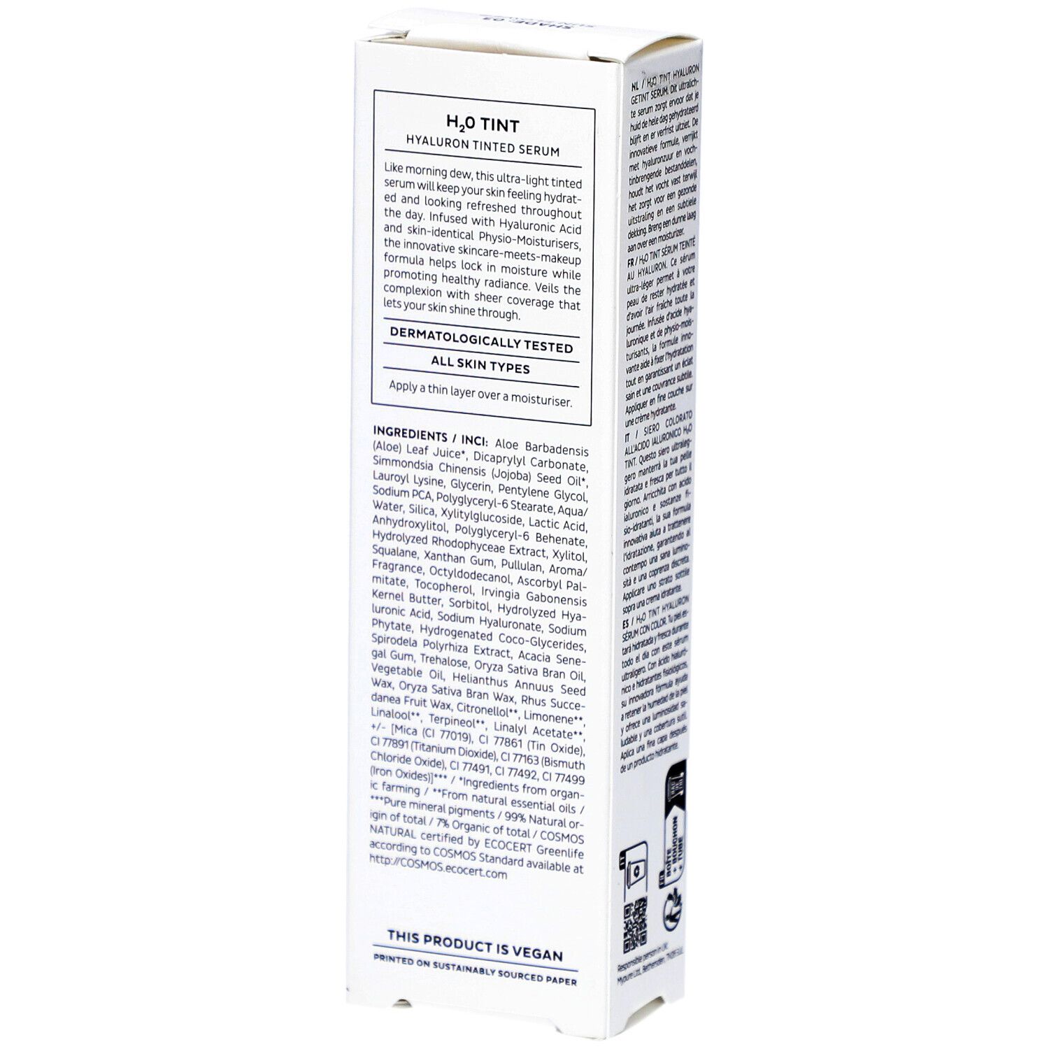 Witte productverpakking met tekst. Merk: MÁDARA. Product: H2O TINT Hyaluron Tinted Serum. Ingrediënten. Veganistisch logo. COSMOS-certificering.