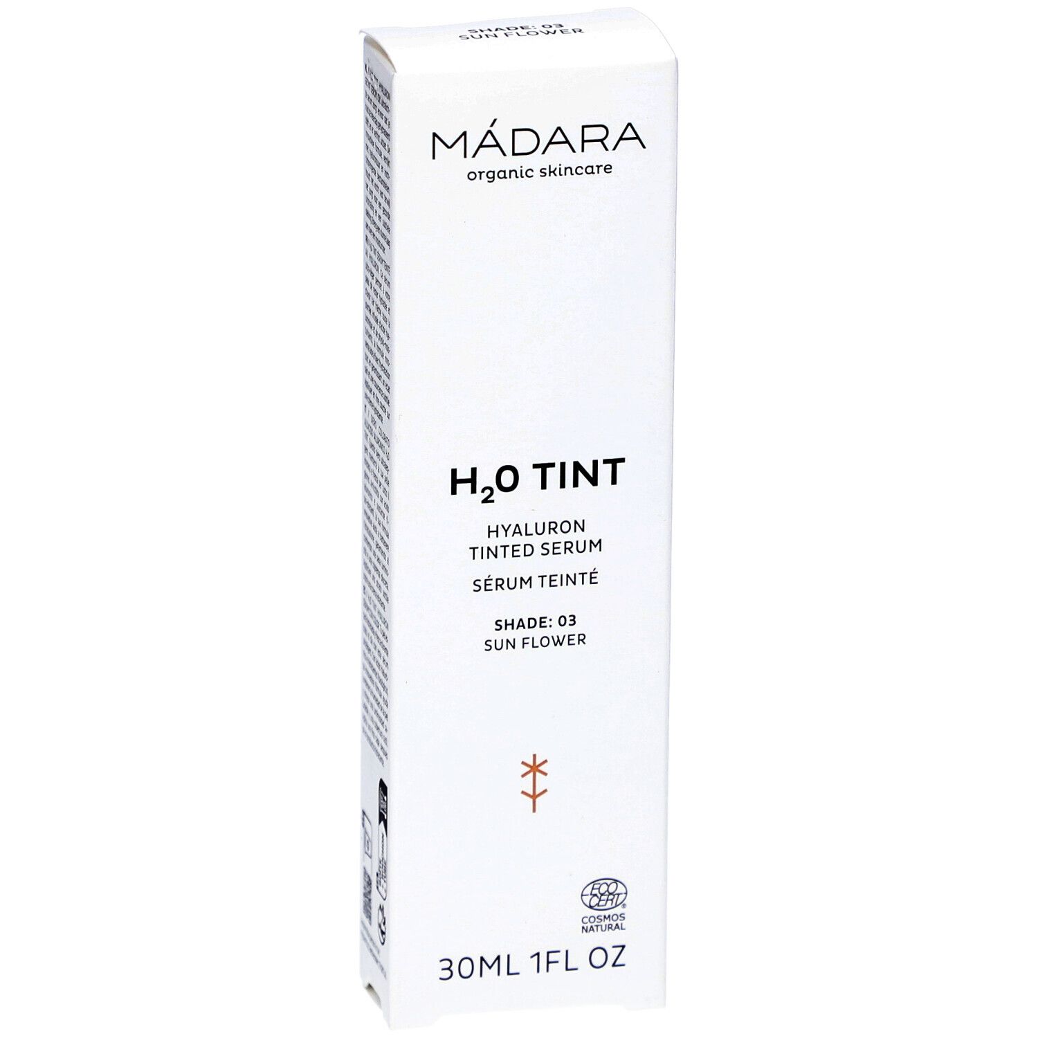 Witte productverpakking met tekst. Merk: MÁDARA. Product: H2O TINT Hyaluron Tinted Serum. Tint: 03 Sun Flower. 30ml/1FL OZ. Logo.