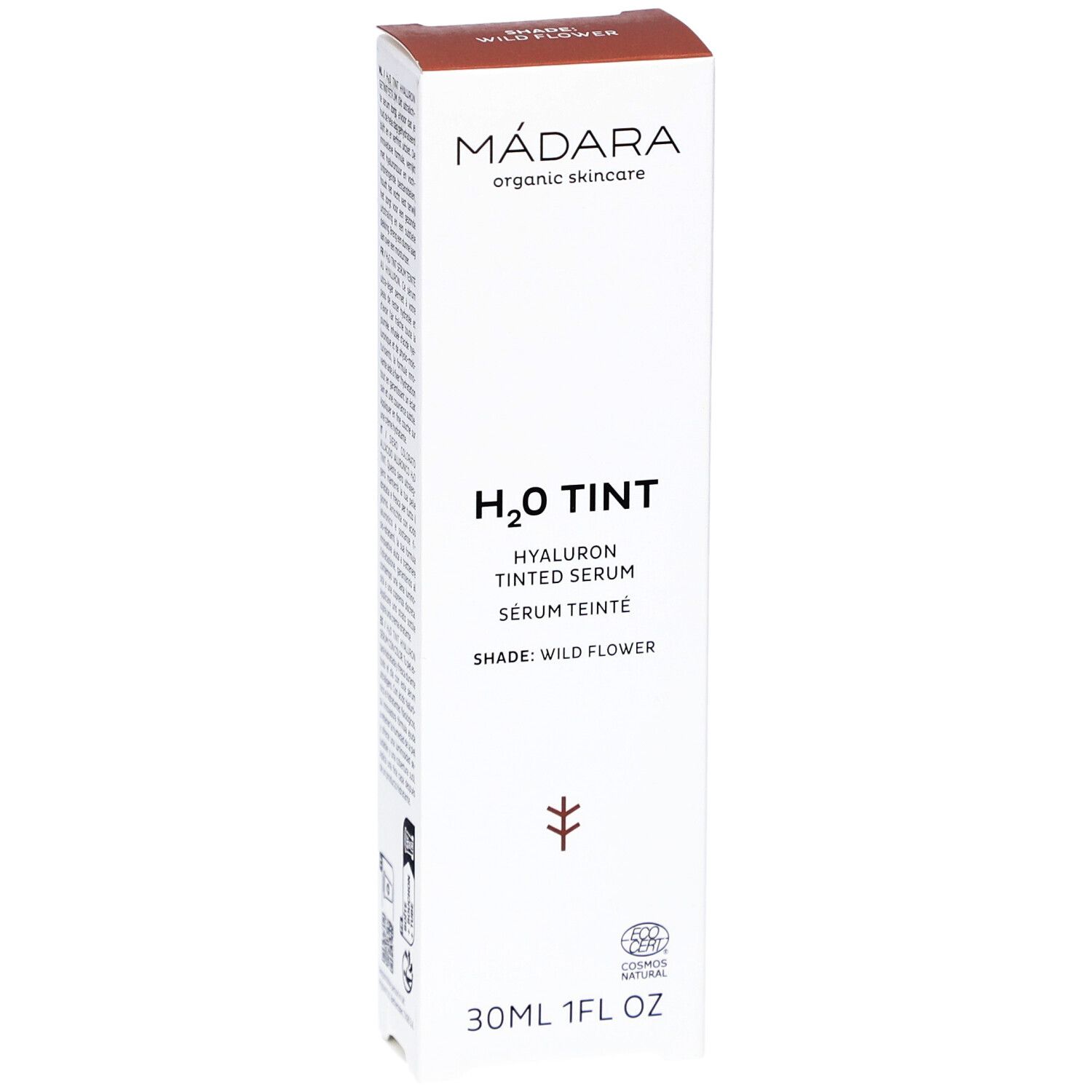 Witte doos met productopdruk. Bruin bovenaan. Opschrift: H2O TINT, Hyaluron Tinted Serum, Shade: Wild Flower. 30ml.