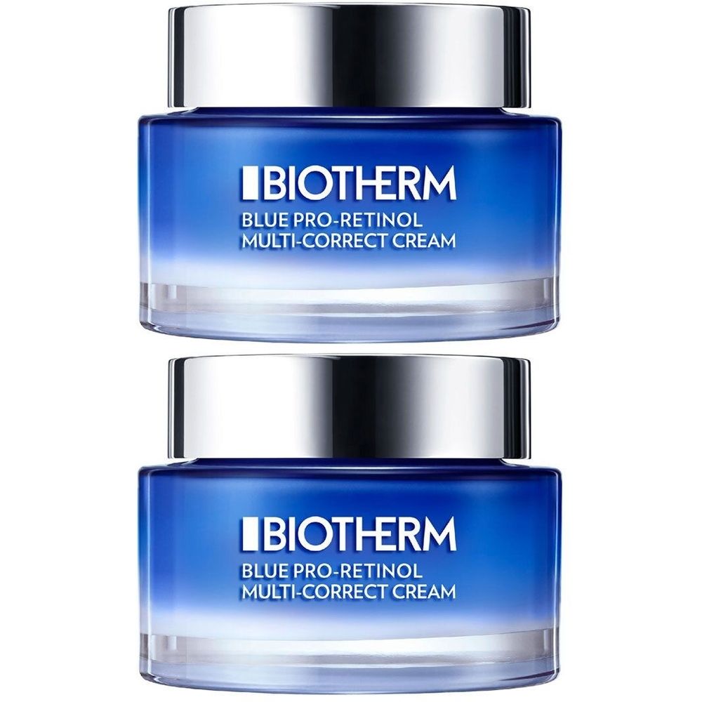 Twee potten Biotherm Blue Pro-Retinol Multi-Correct Cream. Blauwe potten met zilveren deksels. Tekst: BIOTHERM.