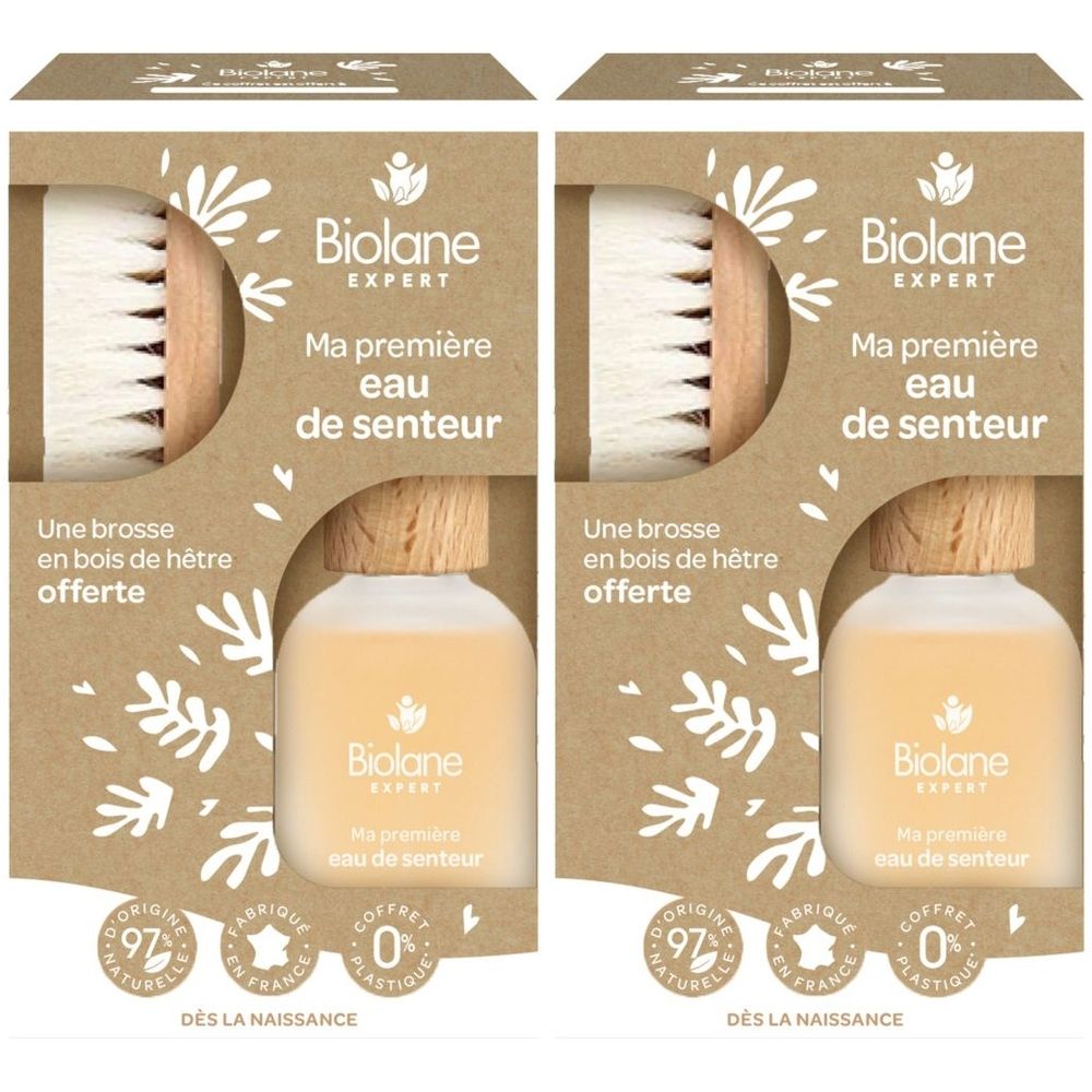 Deux coffrets cadeaux. Contiennent une bouteille et une brosse. Inscription: Biolane Expert, Ma première eau de senteur. 97% d'origine naturelle, dès la naissance.