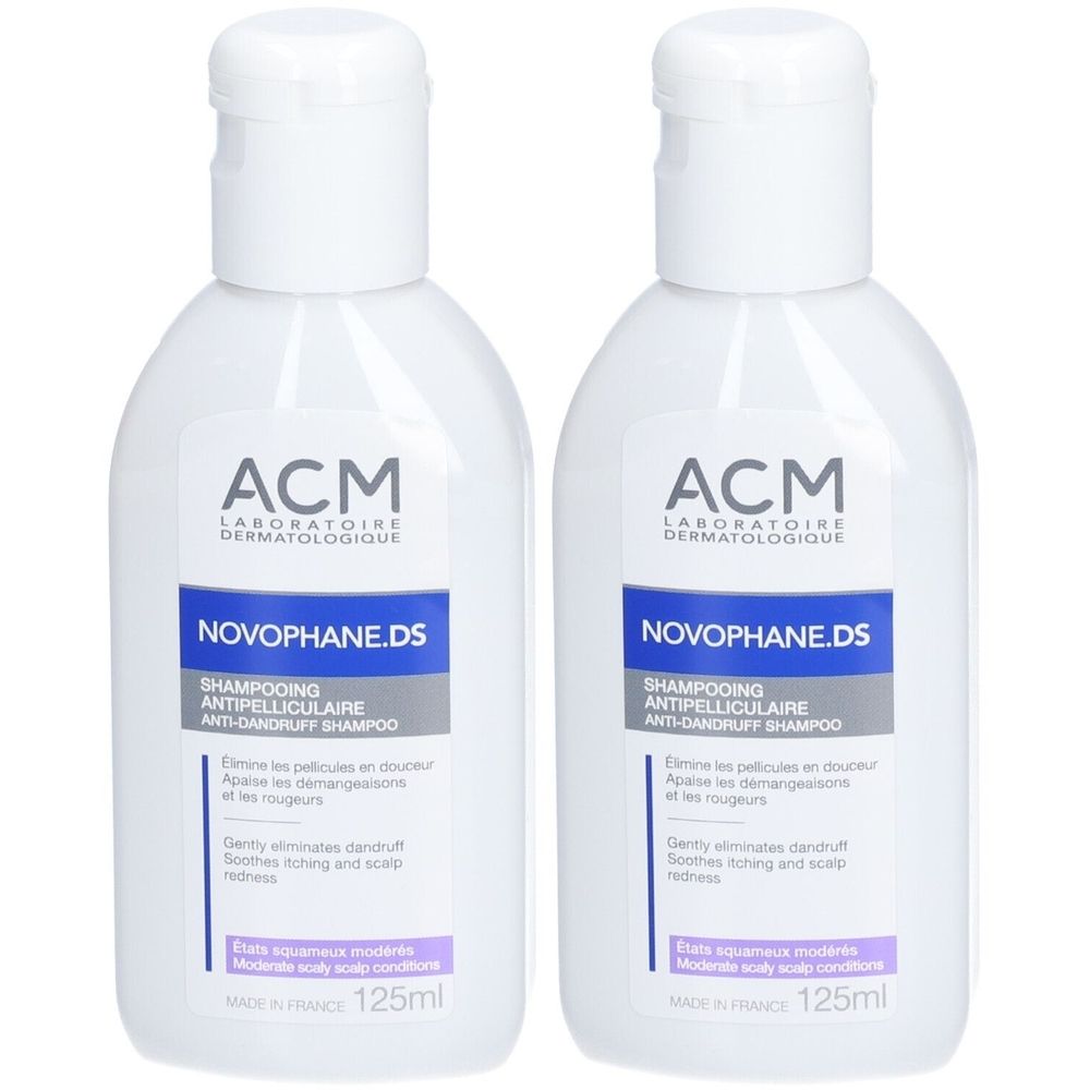 Twee witte flacons met klapdeksel. Opschrift: ACM Novophane.DS Shampooing Antipelliculaire. 125ml.
