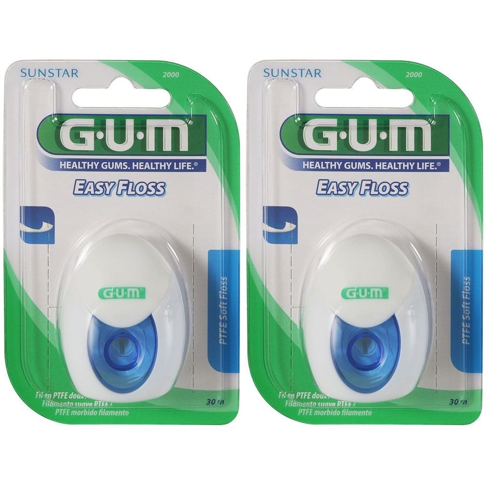Twee verpakkingen flosdraad. Witte, ovale containers met blauwe kern. Opschrift: G•U•M, Easy Floss. Verpakking met groene achtergrond.