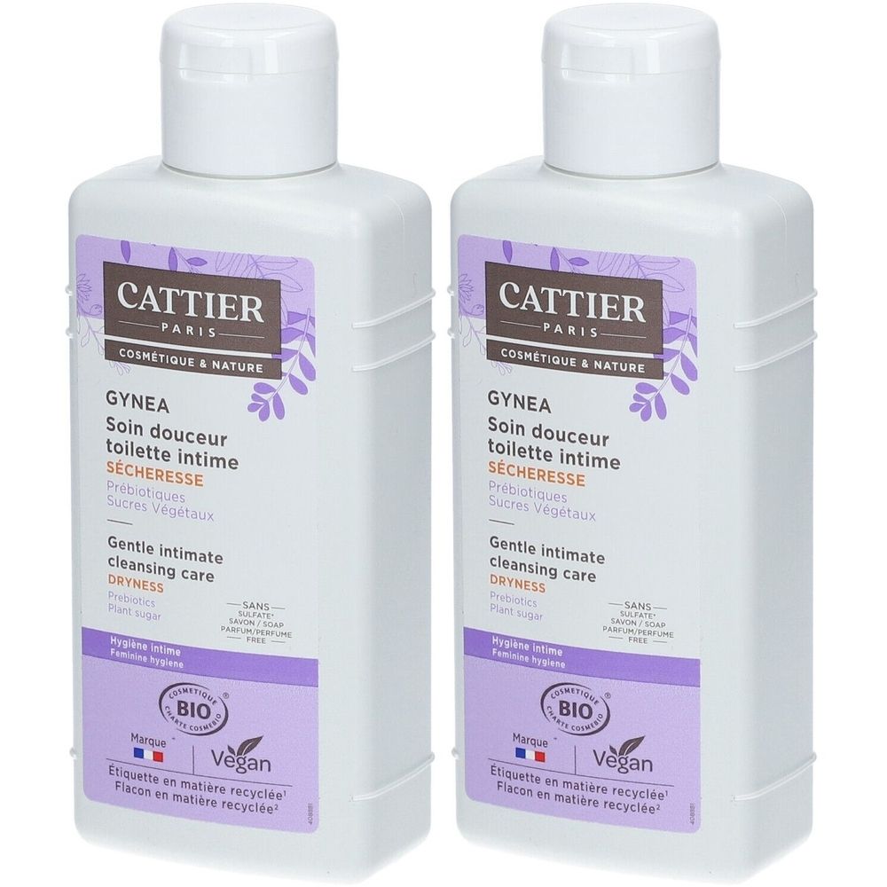 Twee witte flessen met paarse etiketten. Opschrift: GYNEA, Soin douceur toilette intime, BIO, Vegan. Flessen met klapdeksel.