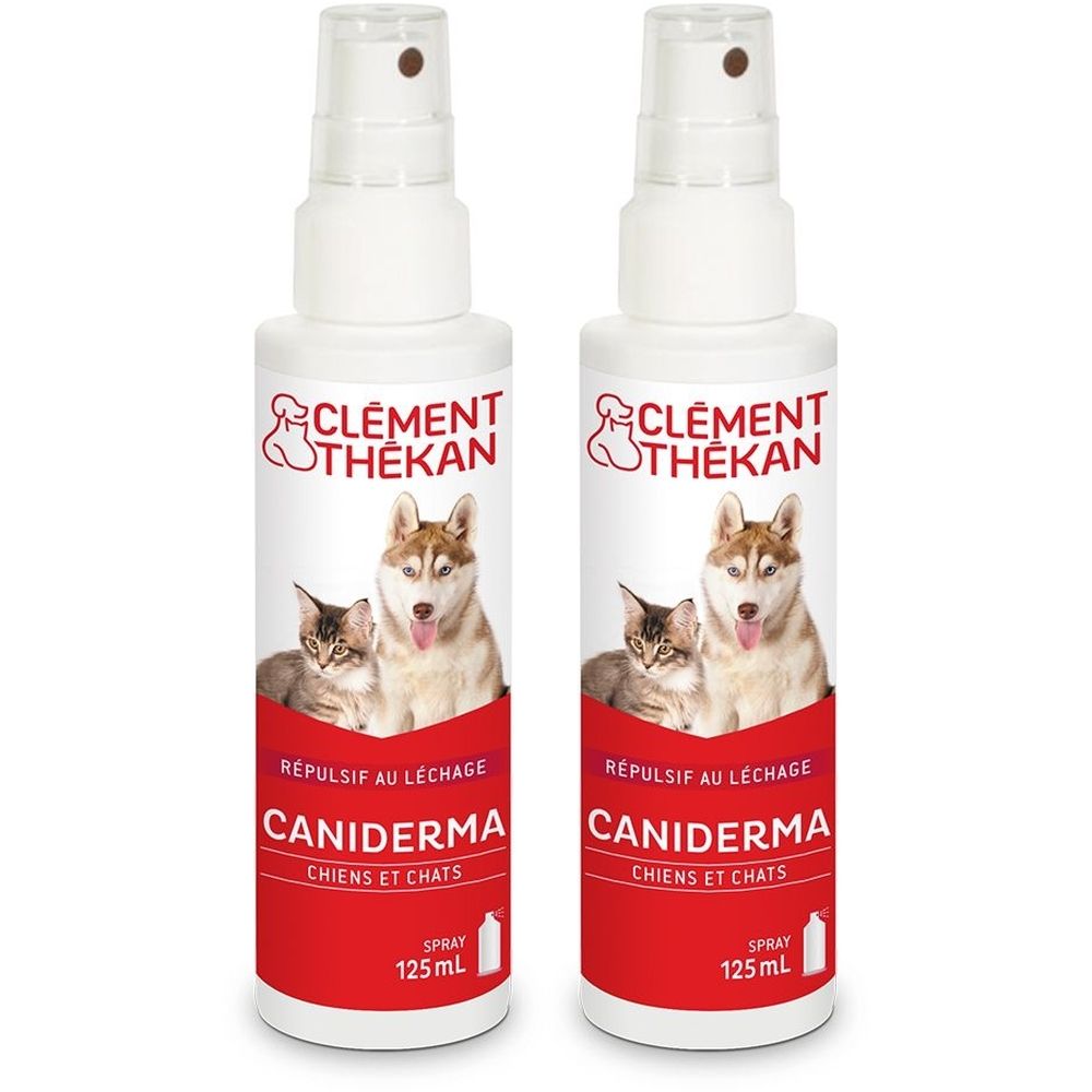 Twee witte spuitflessen. Opschrift: CLEMENT THEKAN, CANIDERMA, voor honden en katten. Rode strook met productinformatie.