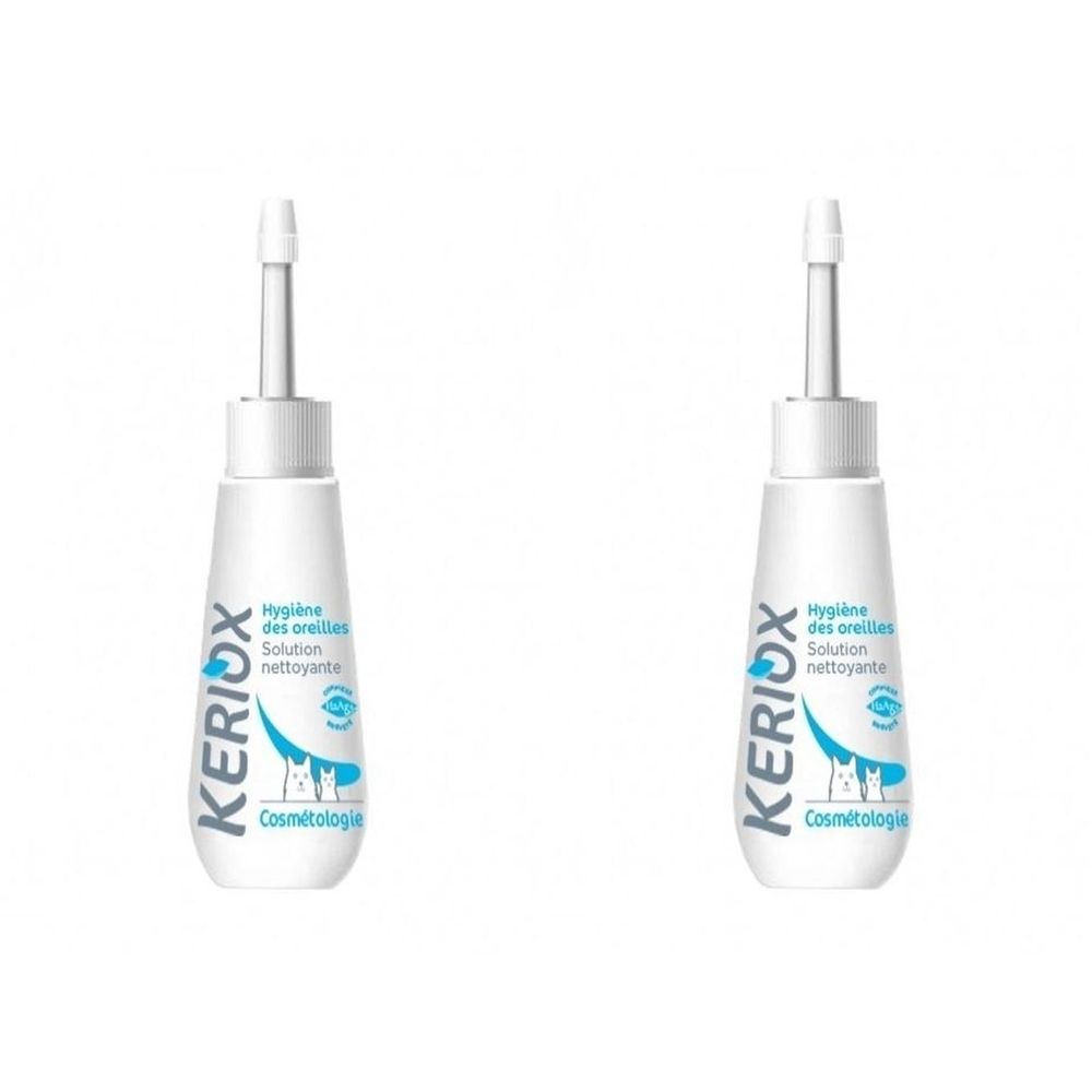 Twee witte flessen met applicator. Opschrift: KERIUX, Hygiène des oreilles, Solution nettoyante, Cosmétologie.