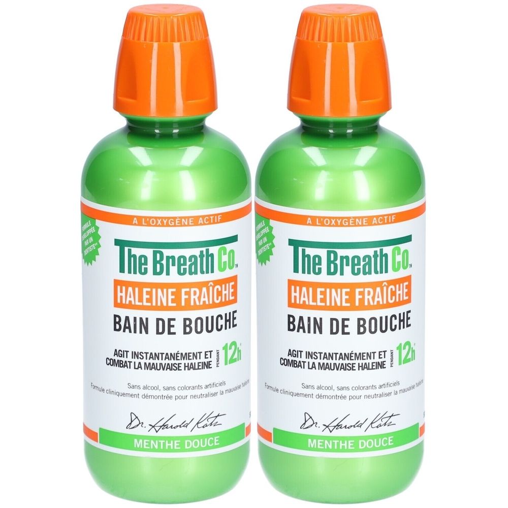Twee groene flessen mondwater met oranje doppen. Opschrift: The Breath Co. HALEINE FRAÎCHE, BAIN DE BOUCHE.
