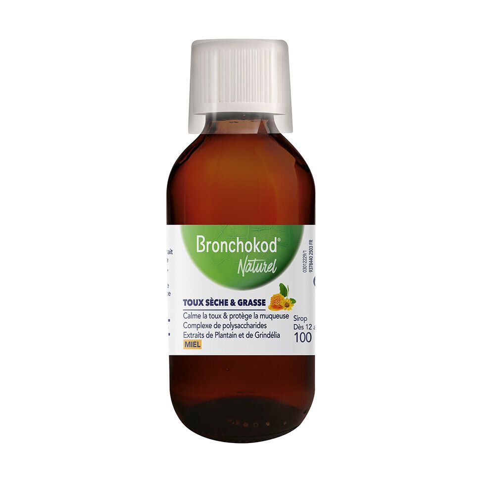 Bruine fles met witte dop. Etiket met productnaam en ingrediënten. Honingsmaak.