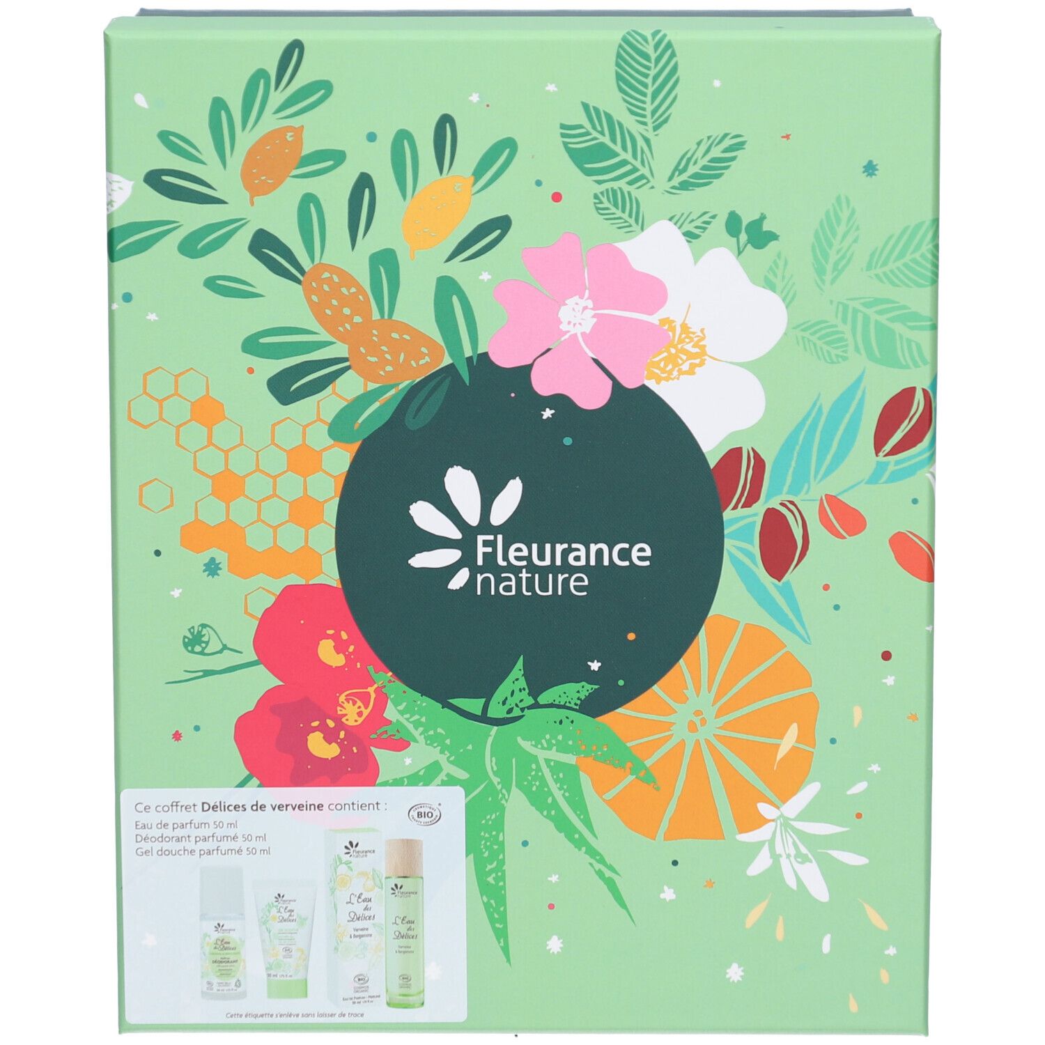 Coffret cadeau vert avec motifs floraux. Logo et nom du produit. Contient trois produits.
