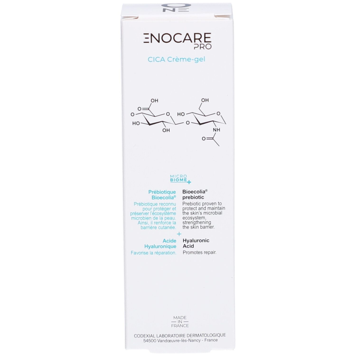 Witte doos, zijaanzicht. Diagram met chemische structuren. Bevat informatie over het product.