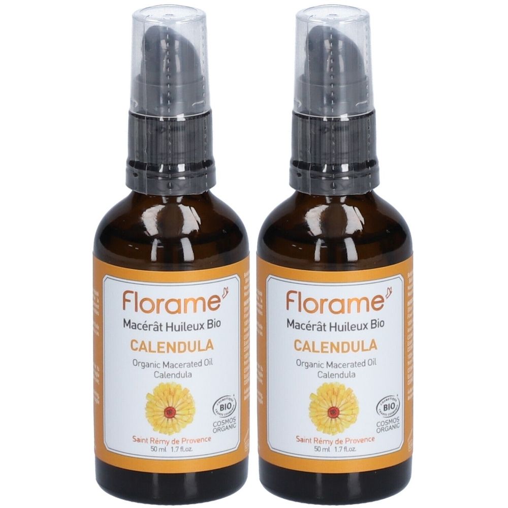 Twee bruine glazen flessen met pomp. Labels met "Florame Macérât Huileux Bio Calendula".