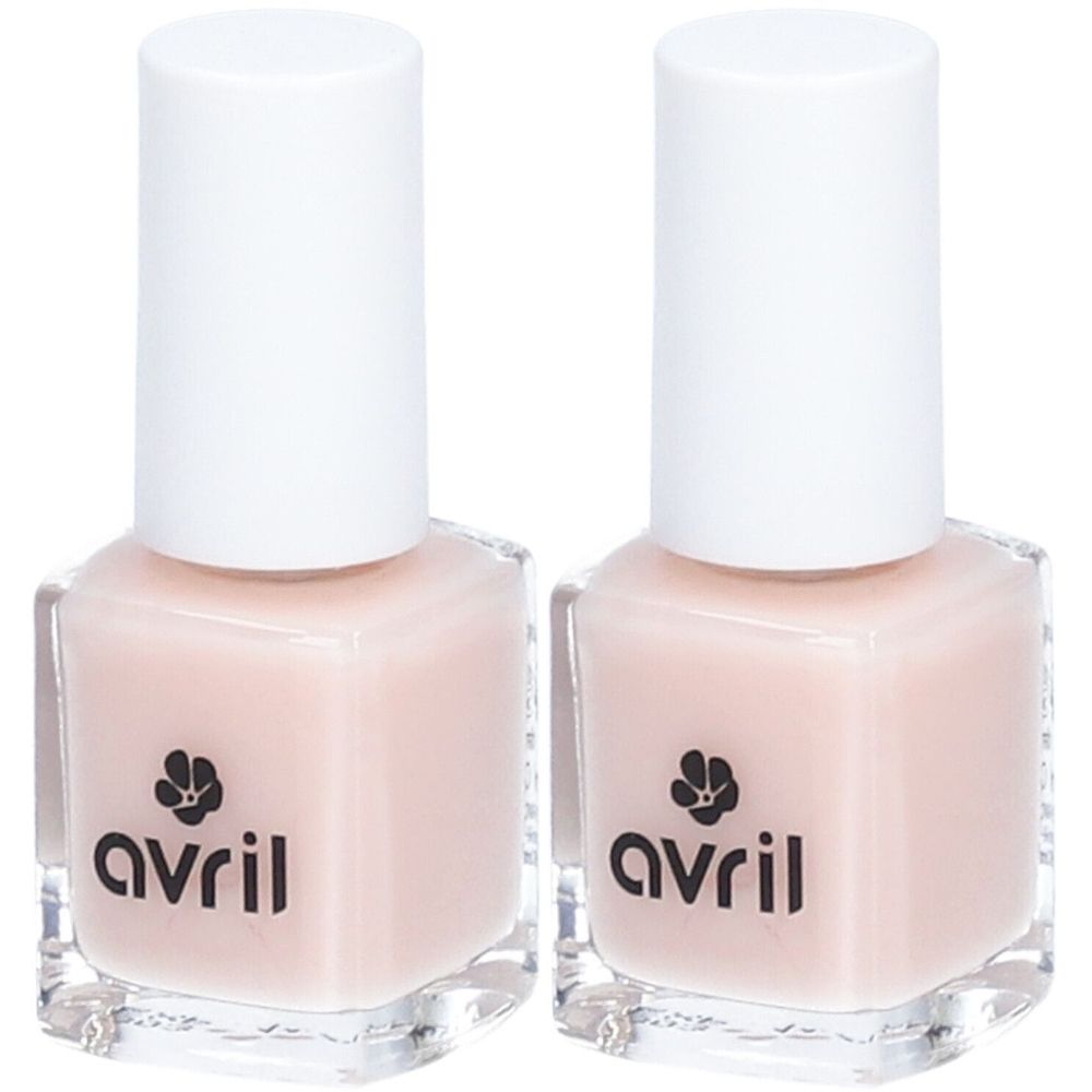 Deux flacons de vernis à ongles nude rosé. Bouchon blanc, forme carrée. Inscription: avril.