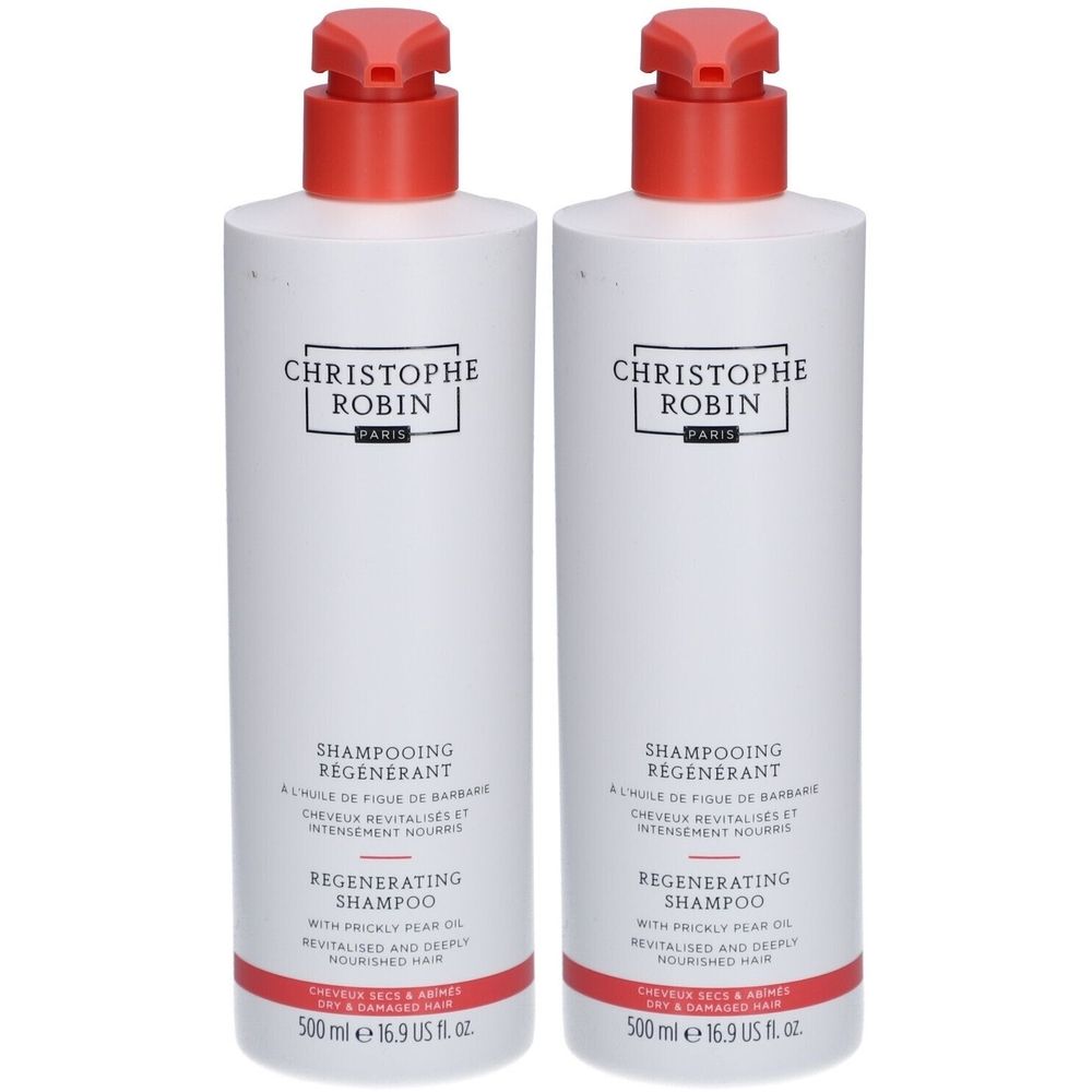 Twee witte flessen met rode dop. Opschrift: CHRISTOPHE ROBIN PARIS, SHAMPOOING REGENERANT, REGENERATING SHAMPOO. 500 ml.