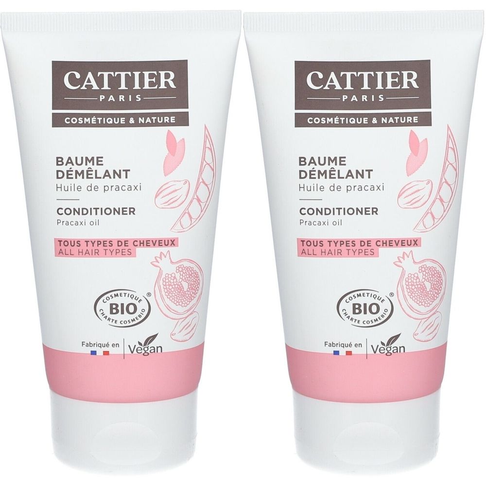 Twee tubes haarconditioner. Opschrift: Cattier Paris, Baume Démêlant, Tous types de cheveux. Bio-certificering en Vegan-keurmerk.
