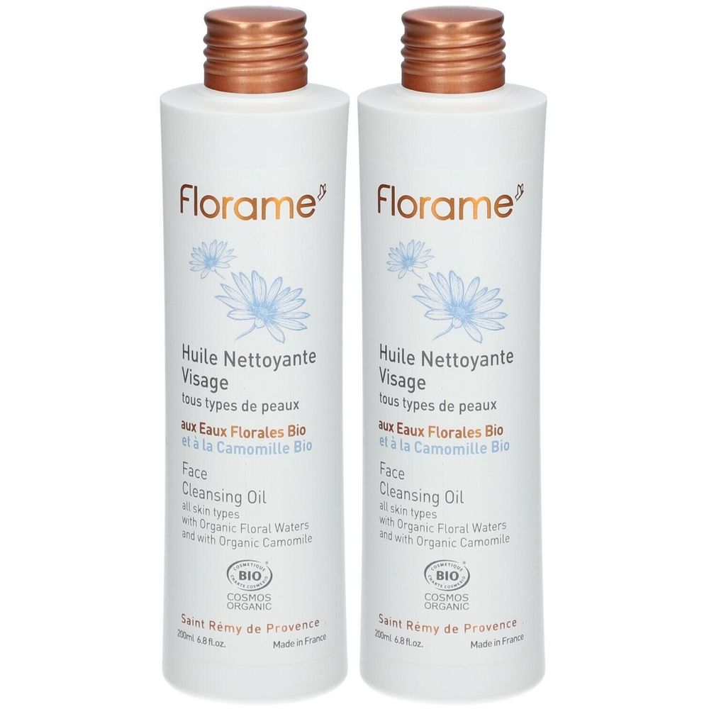 Twee witte flessen met bruine doppen. Opschrift: Florame, Huile Nettoyante Visage, Bio-certificering.