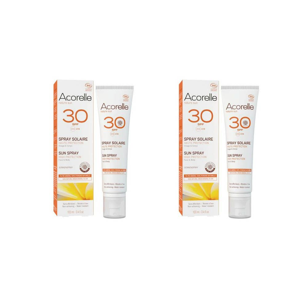 Twee tubes en dozen zonnebrandcrème. Opschrift: Acorelle, 30 SPF, Spray Solaire, Sun Spray.